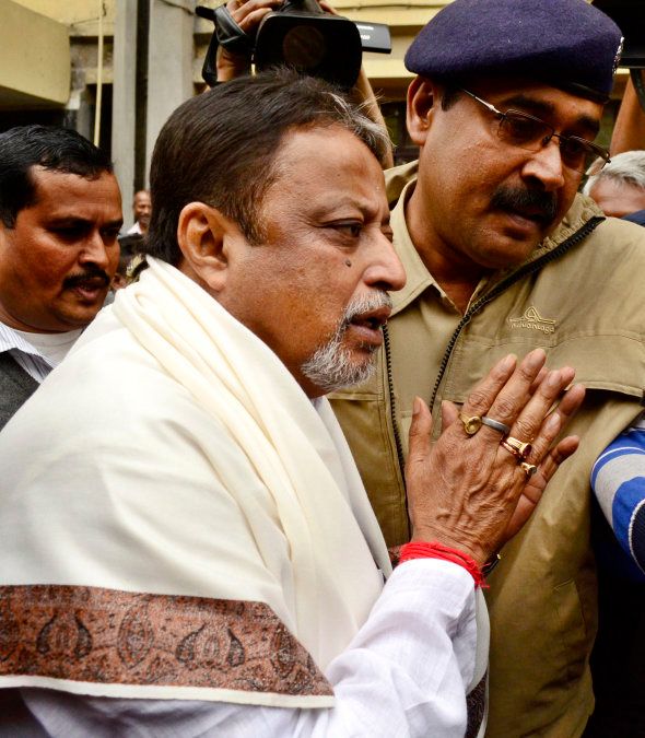 Trinamool Congress General Secretary and Rajya Sabha MP Mukul Roy arrives at the office of the Central Bureau of Investigation (CBI) to face interrogation in connection with the Saradha scam at Salt Lake on January 30, 2015 in Kolkata, India.