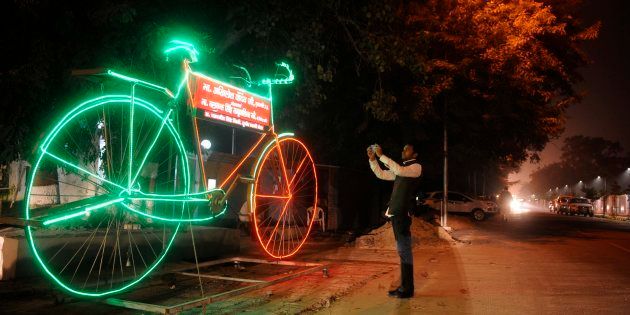 Giant model of Samajwadi Party symbol 'Bicycle' with LED lights.