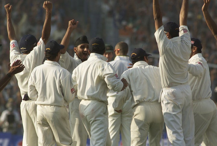 11 Mar 2001: Harbhajan Singh of India celebrates with team mates after claiming the wicket of Shane Warne of Australia, to complete a hat trick, during day one of the 2nd Test between India and Australia played at Eden Gardens, Calcutta, India. X DIGITAL IMAGE Mandatory Credit: Hamish Blair/ALLSPORT