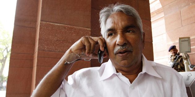 Kerala Chief Minister Oommen Chandy arrives at Parliament House to attend the Parliament budget session on March 26, 2012 in New Delhi, India.