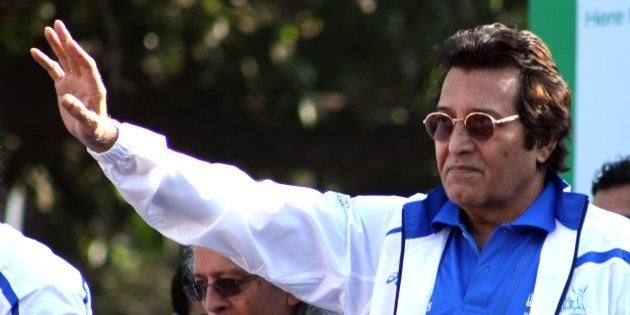 Indian Bollywood celebrity Vinod Khanna poses during the Standard Chartered Mumbai Marathon (SCMM) 2012 in Mumbai on January 15, 2012.