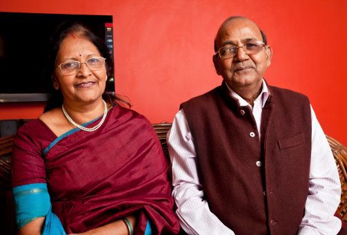 Portrait of Cheerful loving Indian Urban Senior Couple