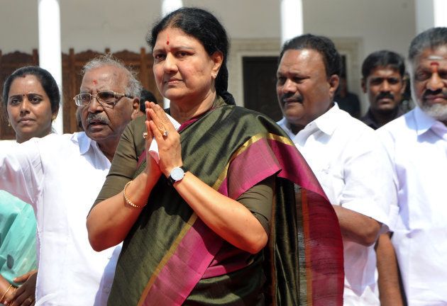 General secretary of southern Tamil Nadu state's ruling All India Anna Dravida Munnetra Kazhagam (AIADMK), VK Sasikala (C) gestures to cadres on her arrival to take up office at the AIADMK headquarters in Chennai on December 31, 2016. VK Sasikala was elected as the general secretary of southern Tamil Nadu state's ruling All India Anna Dravida Munnetra Kazhagam (AIADMK) after its chief, Jayalalithaa -- popularly known as 'Amma' or mother -- died aged 68 on December 5. / AFP / Arun SANKAR (Photo credit should read ARUN SANKAR/AFP/Getty Images)