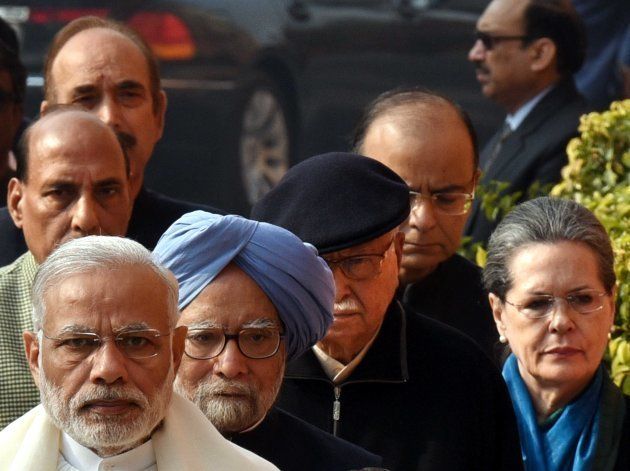 Prime Minister Narender Modi, former Prime Minister Manmohan Singh, Sr. BJP leader Lal Krishna Advani, UPA Chairperson Sonia Gandhi and Union Home Minister Rajnath Singh, Finance Minister Arun Jaitley and Congress leader Ghulam Nabi Azad arrive for the flower tribute to the martyrs who sacrificed their lives during Parliament terrorist attack at Parliament House on December 13, 2016 in New Delhi, India.