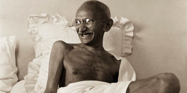 Image result for rare images of smiling gandhiji