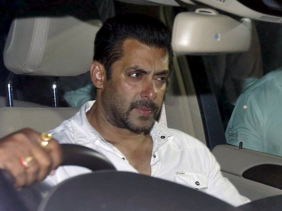 Bollywood actor Salman Khan sits in a car as he leaves a court in Mumbai, India, May 6, 2015. An Indian court sentenced Bollywood film star Khan on Wednesday to five years in prison for killing a man in a hit-and-run accident, the latest twist in the tumultuous career of one of the country's biggest box-office draws. Khan later secured two days of interim bail from Mumbai's high court and will return to court on Friday for a hearing on having the bail extended. REUTERS/Shailesh Andrade