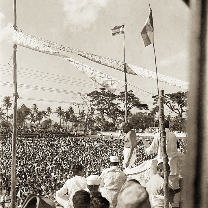 Mahatma Gandhi at a mass meeting, Bengal, 1945.