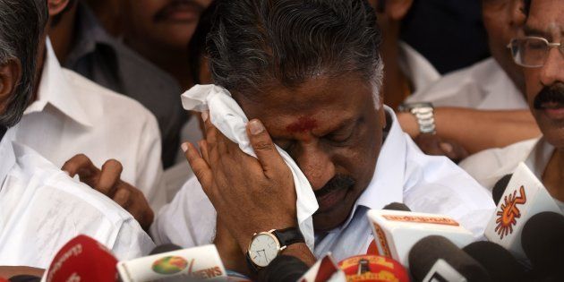 Acting chief minister O Panneerselvam (C) of the southern Indian state of Tamil Nadu gestures during a press conference at his home in Chennai on February 14, 2017.India's Supreme Court jailed the annointed next leader of Tamil Nadu for four years for corruption on February 14, heightening the turmoil in a state still reeling from the death of its long-time matriarch. VK Sasikala was told to surrender immediately to prison authorities after judges overturned her acquittal in a long-running 'disproportionate assets' case that also involved her late mentor Jayalalithaa Jayaram. Sasikala has been involved in a bitter battle in recent weeks with the state's acting chief minister O Panneerselvam who has been trying to block her ascent. / AFP / ARUN SANKAR (Photo credit should read ARUN SANKAR/AFP/Getty Images)
