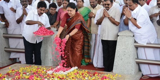 All India Anna Dravida Munnetra Kazhagam (AIADMK) leader VK Sasikala pays her respects at the memorial for former state chief minister Jayalalithaa Jayaram before leaving to surrender to authorities, following a Supreme Court ruling, in Chennai on February 15, 2017.