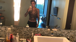 Justin Bieber Debuts Giant Tattoo Covering His