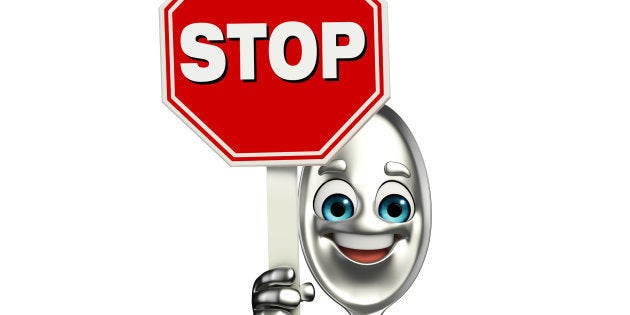 Cartoon character of Spoon with stop sign