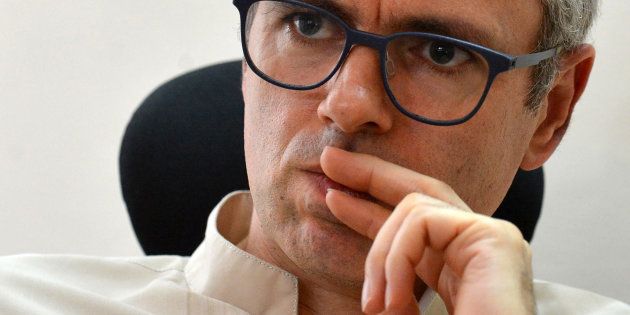 In this photograph taken on July 27, 2016, former Chief Minister of Jammu and Kashmir Omar Abdullah speaks during an interview with AFP at his office in Srinagar.
