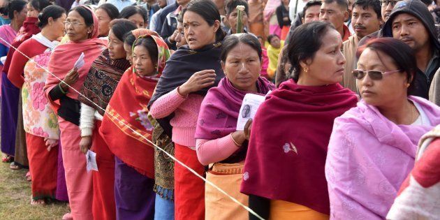 Voters queue at a polling station in Thoubal on 8 March 2017 in Manipur.