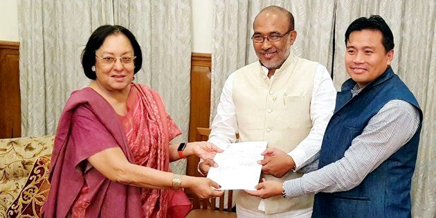 Manipur Governor Najma Heptulla handing over the invitation letter to BJP leader Nongthombam Biren Singh to form the government of Manipur at Raj Bhavan, Imphal, Manipur on Tuesday.