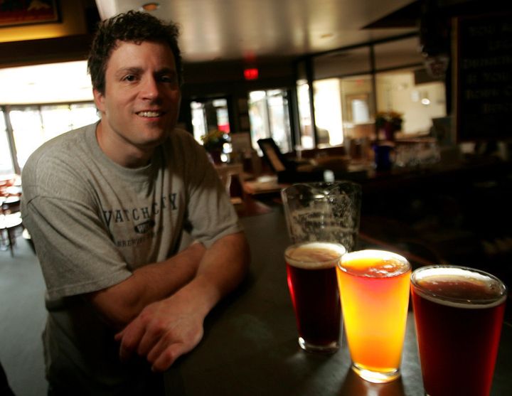WALTHAM, MA - MAY 11: Aaron Mateychuk, master brewer at Watch City Brewery in Waltham, proudly displays Indian Pale Ales, left to right, Red, American and Dunkel Weizen. (Photo by Essdras M Suarez/The Boston Globe via Getty Images)