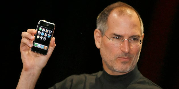 Apple chief executive Steve Jobs unveils a new mobile phone