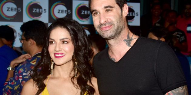 MUMBAI, MAHARASHTRA, INDIA - 2018/07/09: American-Canadian-Indian actress Sunny Leone with husband Daniel Weber pose for picture on the event where her Biopic 'Karenjit Kaur' launch in Mumbai. (Photo by Azhar Khan/SOPA Images/LightRocket via Getty Images)