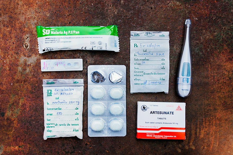 A community health worker's malaria kit includes Artesunate tablets (antimalarials) and a rapid diagnostic test—the two essentials in combating malaria.