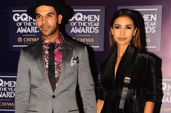 Indian Bollywood actors Rajkummar Rao and Patralekha attend GQ India's ninth anniversary with the annual Men of the Year Awards 2017 in Mumbai on September 22, 2017. / AFP PHOTO / STR (Photo credit should read STR/AFP/Getty Images)