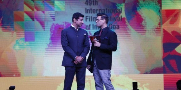 Rajyavardhan Rathore and Karan Johar at the opening ceremony of IFFI 2018 on Tuesday.