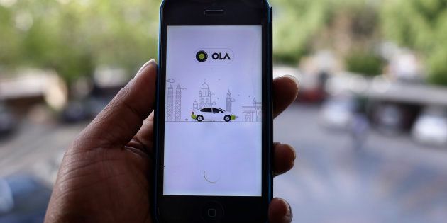 Ola's cab-hailing smartphone app is seen on a mobile phone