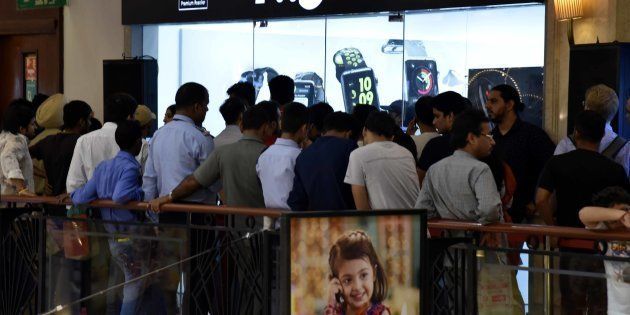 NEW DELHI, INDIA - OCTOBER 7: People standing in queue during the launch of new iPhone 7 at world showroom DLF promenade