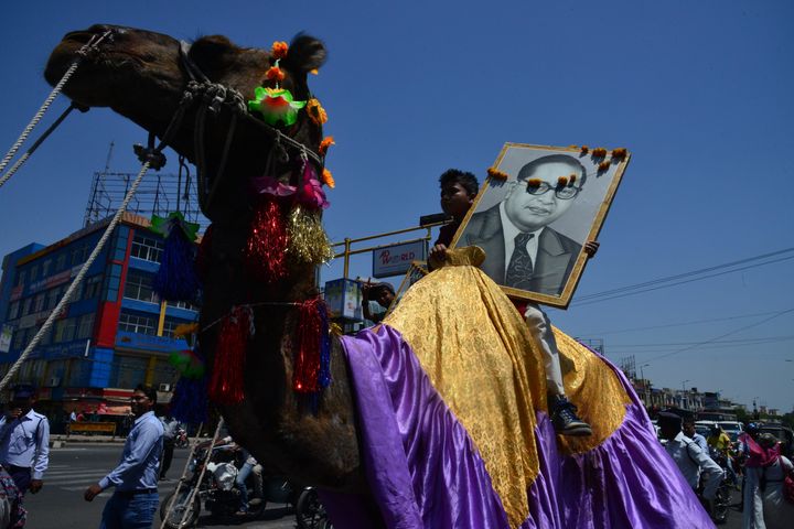 BHOPAL, INDIA - APRIL 14: Followers celebrate the 125th birth anniversary of Dr. B.R. Ambedkar, on April 14, 2016 in Bhopal, India. Bhimrao Ramji Ambedkar, popularly known as Babasaheb, is considered as the Father of Indian Constitution, the biggest and the most complex constitution in the world. The United Nations for the first time observed the 125th birth anniversary of Dr. BR Ambedkar, also dubbed 'Ambedkar Jayanti', at the UN headquarters in New York. Born on April 14, 1891 to Bhimabai Sakpal and Ramji in Madhya Pradesh, Ambedkar was the Chief Architect of India's constitution. He died on December 6, 1956. (Photo by Mujeeb Faruqui/Hindustan Times via Getty Images)