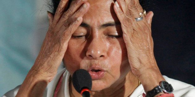 Mamata Banerjee, Chief Minister of India's eastern state of West Bengal, gestures during a news conference after a meeting of her Trinamool Congress party (TMC) in Kolkata.