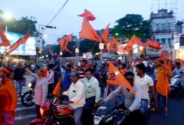 Hindu devotees rallied with saffron flags and shouted slogan during the rally.