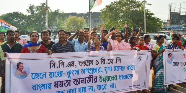 The Kolkata unit of Trinamool Congress Party hold a protest march in Kolkata. The rally started from Sealdah area and concluded at Esplanade, defending their leaders who were seen taking bribes in Narada News sting operation issue.