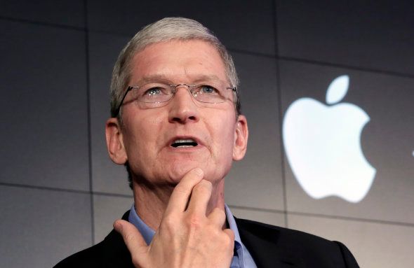 FILE - In this April 30, 2015 file photo, Apple CEO Tim Cook