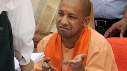 The Real Reason Why Yogi Adityanath Is Distributing School Bags In UP With Akhilesh's Face On