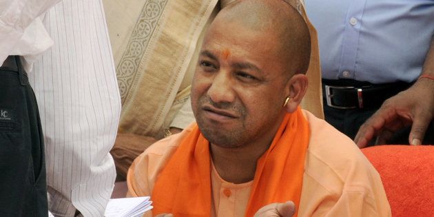 Uttar Pradesh Chief Minister Yogi Adityanath talking to LDA officials during the inspection of Gomti River Front.