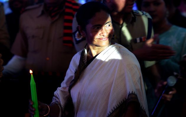The chief minster of eastern West Bengal state, Mamata Banerjee gestures as she attends a function on road safety, organised by the state police, in Kolkata on August 18, 2016.