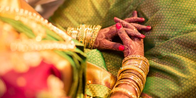 Mehndi, application of henna as skin decoration in Indian Wedding.