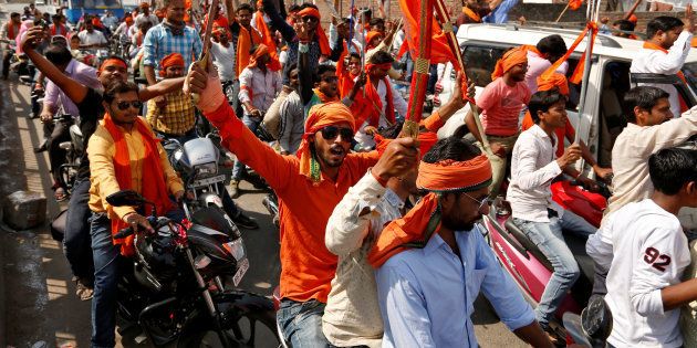 Hindu Yuva Vahini vigilante members take part in a rally in the city of Unnao, India, April 5, 2017.