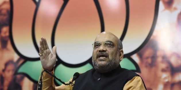 BJP National President Amit Shah addresses the media after winning Assam Assembly election 2016 as the election results of five States - Assam, Tamil Nadu, West Bengal, Karela, and Pondicherry come out, at BJP HQ, on May 19, 2016 in New Delhi, India.