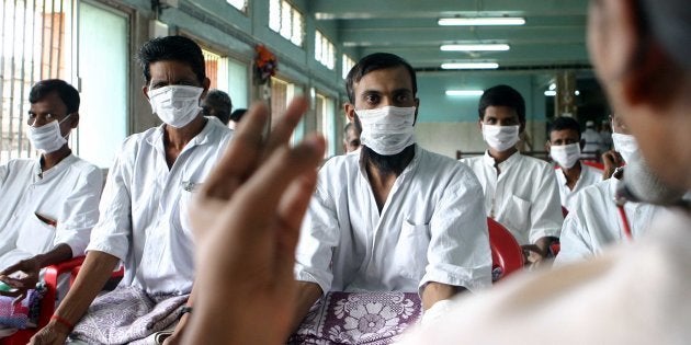 MUMBAI, INDIA - AUGUST 25, 2006: Diseases Patients with Tuberculosis undergoing Yoga therapy at Sewri Hospital on Friday. (Photo by Vikas Khot/Hindustan Times via Getty Images)