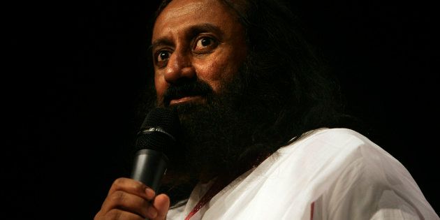 Indian spiritual leader, humanitarian and teacher, Sri Sri Ravi Shankar speaks to an South African audience gathered in Milnerton, Cape Town, on August 28, 2012.