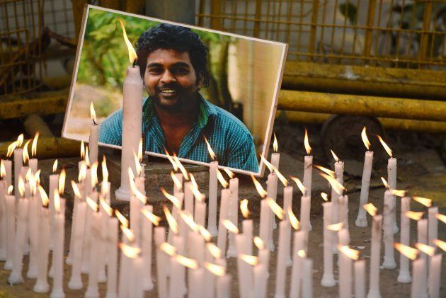 Activists of various organizations participate in a candlelight march to observe Rohith Vemula's first death anniversary at Jantar Mantar.