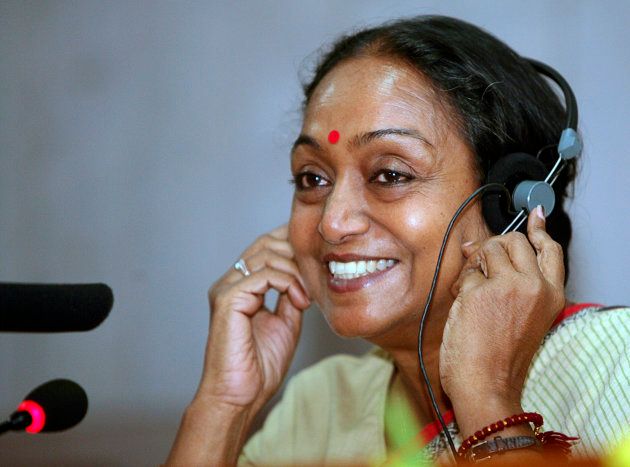 India's newly elected parliament speaker Meira Kumar adjusts her headphone during a news conference in New Delhi June 3, 2009.