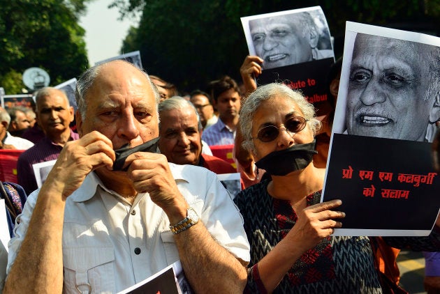 Writers and cultural activists on a silent protest march from Shree Ram Centre to Sahitya Akademi to urge the latter to take a strong stand against rising intolerance in the country, to defend freedom of speech and to condemn the killing of writer MM Kalburgi and others. October 23, 2015, New Delhi, India. (Photo by Priyanka Parashar/Mint via Getty Images)