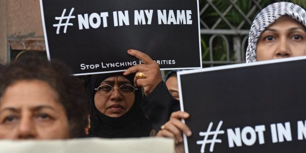 People participate in support of the campaign 'Not In My Name' against lynching of a Muslim teenager Junaid, at Carter Road, Bandra, on June 28, 2017 in Pune.