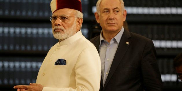 Indian Prime Minister Narendra Modi accompanied by Israeli Prime Minister Benjamin Netanyahu (R) during a visit to Yad Vashem Holocaust memorial in Jerusalem July 4, 2017.