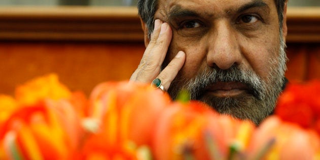 Anand Sharma pauses during a ceremony for India's Accession to the Madrid Protocol at the World Intellectual Property Organization (WIPO) in Geneva April 8, 2013.