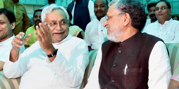 Nitish Kumar and Shushil Kumar Modi after they were sworn-in as Bihar Chief Minister and Dy Chief Minister respectively, at a ceremony in Patna on Thursday.