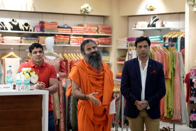 NEW DELHI,INDIA-NOVEMBER 05: Baba Ramdev during the opening of his clothing showroom Patanjali Paridhan at Netaji Subhash Place, in New Delhi. (Photo by Hardik Chhabra/India Today Group/Getty Images)
