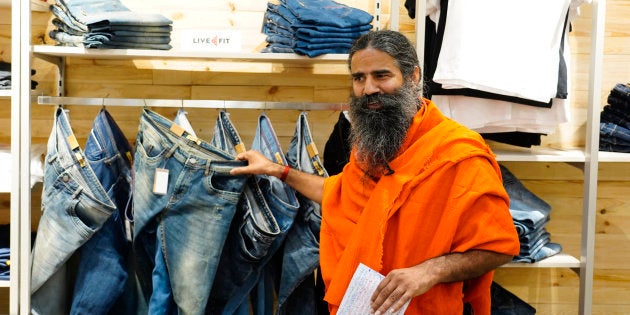 NEW DELHI,INDIA-NOVEMBER 05: Baba Ramdev during the opening of his clothing showroom Patanjali Paridhan at Netaji Subhash Place, in New Delhi. (Photo by Hardik Chhabra/India Today Group/Getty Images)