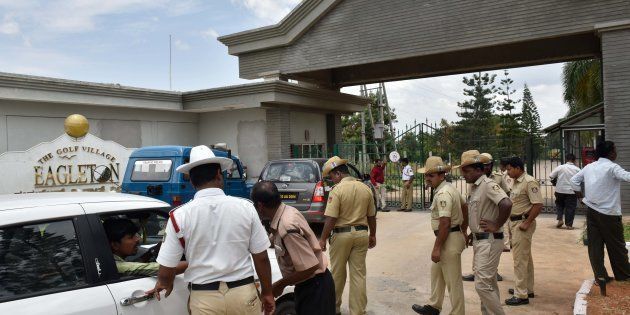 Police frisking cars going inside The Golf Village Eagleton resort as Congress MLAs from Gujarat are staying here at Bidadi outside on July 29, 2017 in Bengaluru.