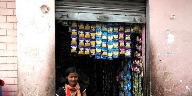 Krishna works as an Internet Saathi in Basai Nawab, near Dholpur, teaching other villagers how to use the Internet. She agreed to have her picture taken along with her shop, which she set up with her earnings as an Internet Saathi.